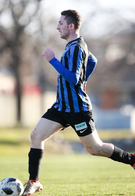 HARD TO CATCH: Myrtleford's Tom Youngs finished off the season in top form and has been predicted by most coaches to win the AWFA senior men's Star Player.