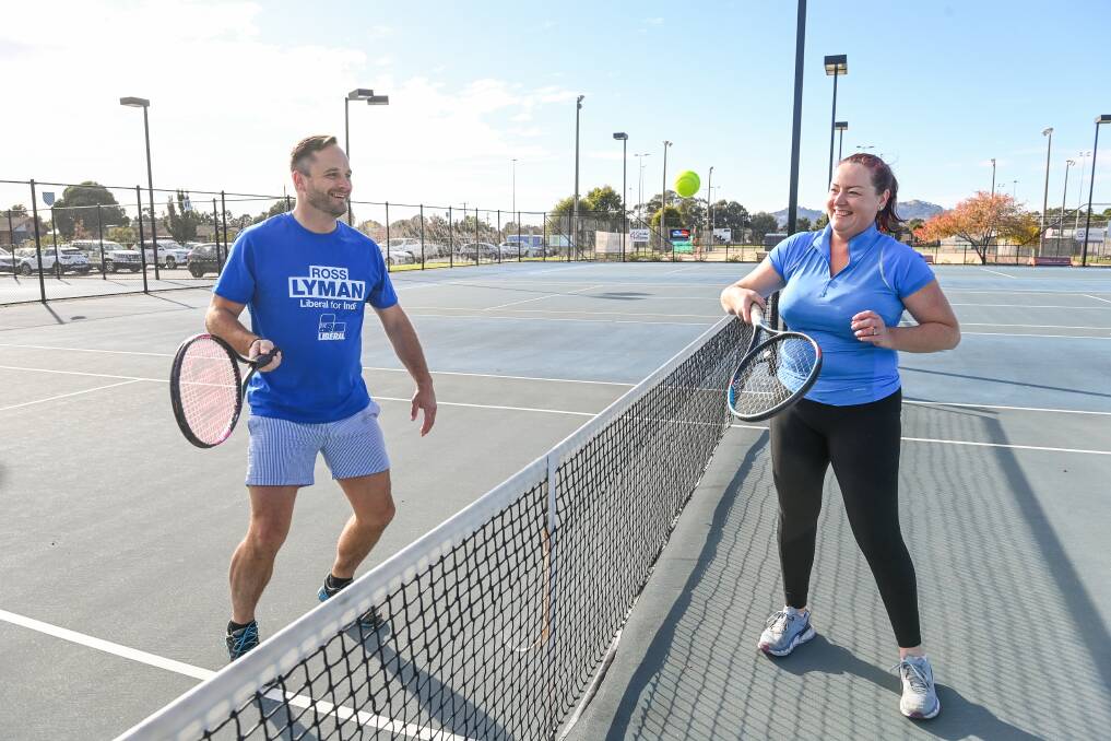 IN THE SWING: Liberal and Nationals Indi candidates Ross Lyman and Liz Fisher having a hit at Wodonga Tennis Centre after a $3 million funding promise. Picture: MARK JESSER