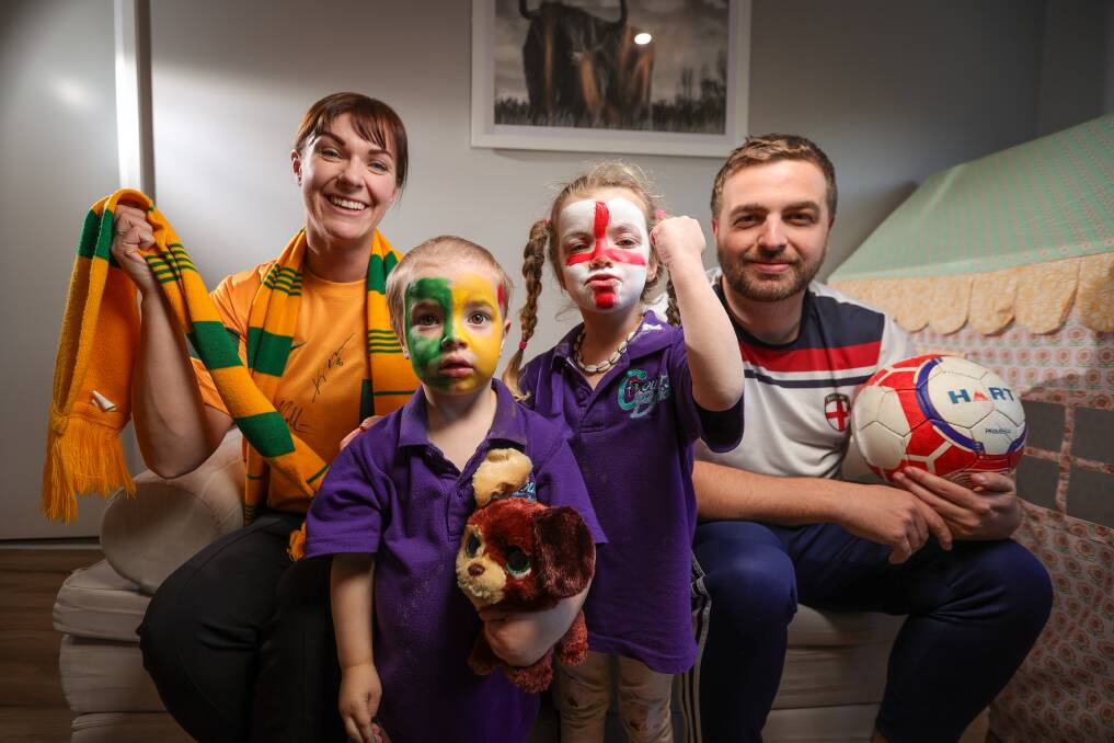 Wangaratta's Sarah Morris and Dan Kelly, with their daughters Matilda, 2, and Penelope, 3, getting into the spirit of the FIFA Women's World Cup ahead of Australia's semi-final clash with England on Wednesday, August 16. Picture by James Wiltshire