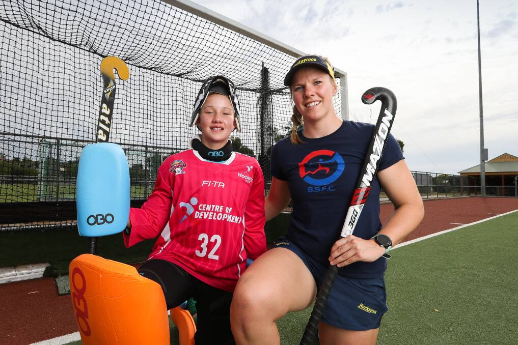 DETERMINED: Jocelyn Bartram, pictured with Goulburn's Bridie Robertson, is fighting for a spot in the Hockeyroos' Commonwealth Games squad. Picture: MARK JESSER