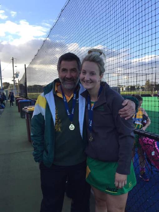 WINNERS ARE GRINNERS: Tony and Chloe Jones celebrate after both winning gold medals at the Victorian Country Championships in Geelong. 