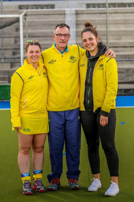 TOUGH CALL: Georgia McCormick (right) with Australian Country captain Sam Daly and team manager Brian Wild, was forced to retire from hockey at 25 due to concussion.