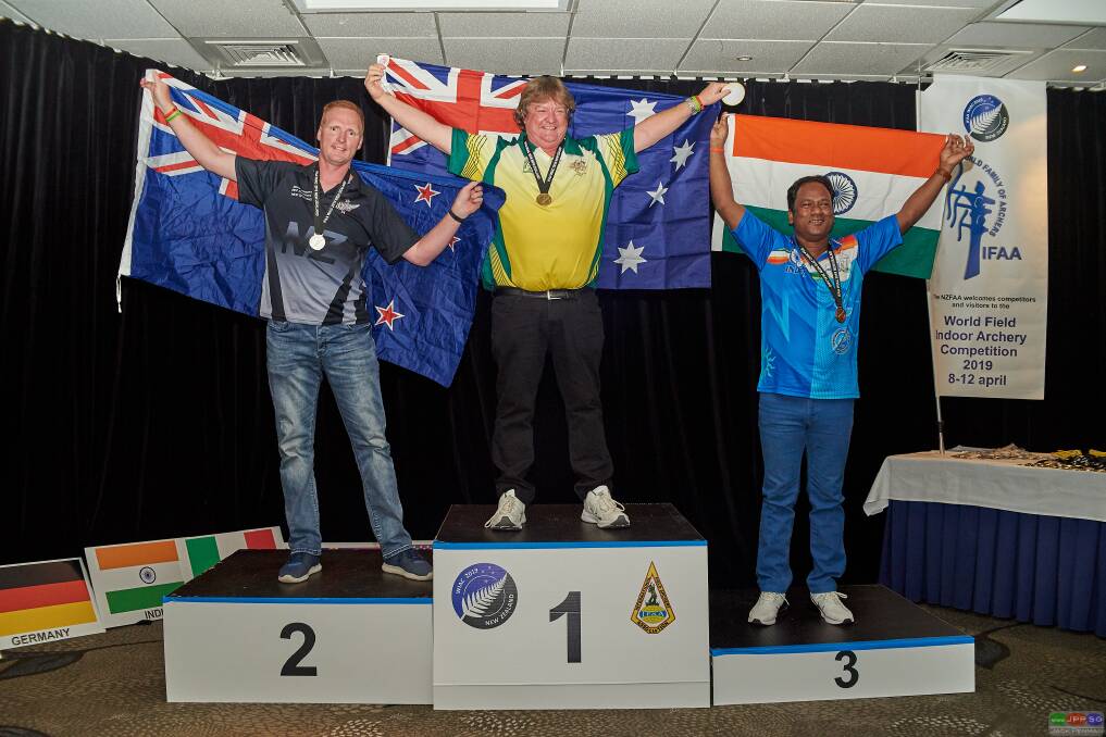 GREEN AND GOLD: Albury archer Trevor Aldred celebrates his gold medal in the senior freestyle limited compound category at the World Indoor Archery Championship in New Zealand.