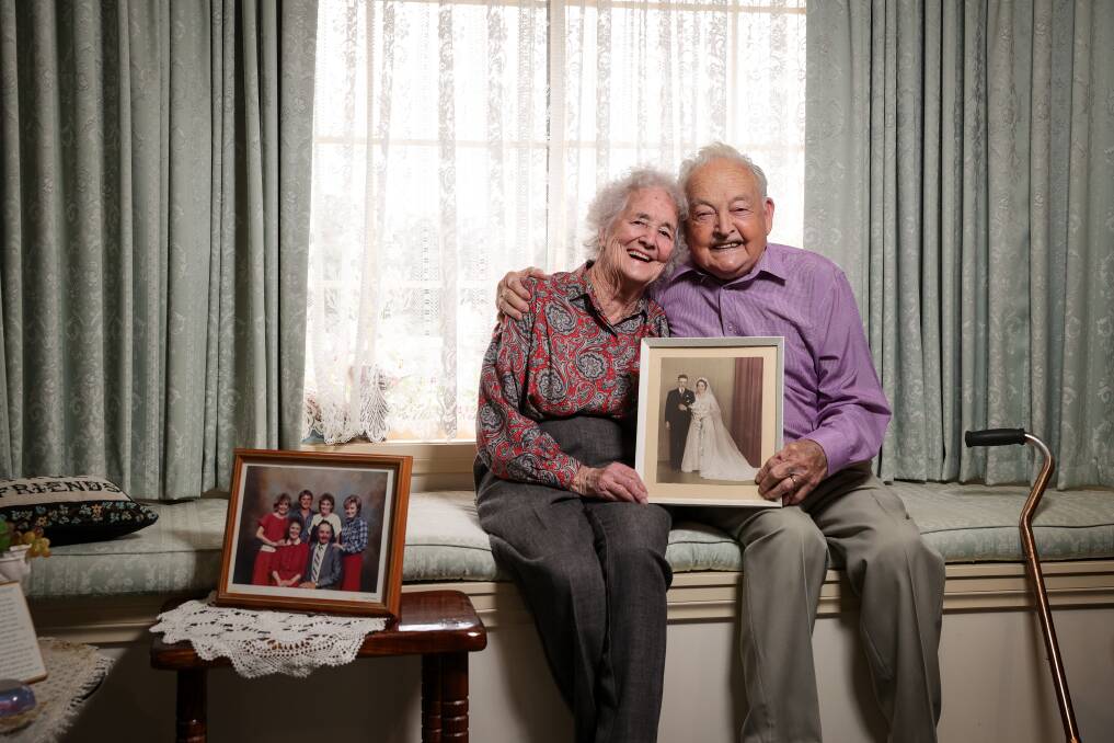LONG-TIME LOVERS: Retired Barnawartha farmers Irene and Colin Margery reflect on the many highlights of their 70 years of marriage in their Wodonga home. Picture: JAMES WILTSHIRE