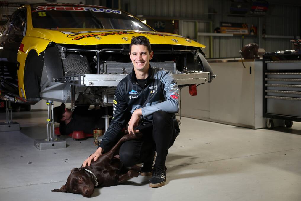 READY TO RACE: Brad Jones Racing's Nick Percat, picked with his dog, Nelson, is excited to get back behind the wheel in Darwin this weekend. Picture: JAMES WILTSHIRE