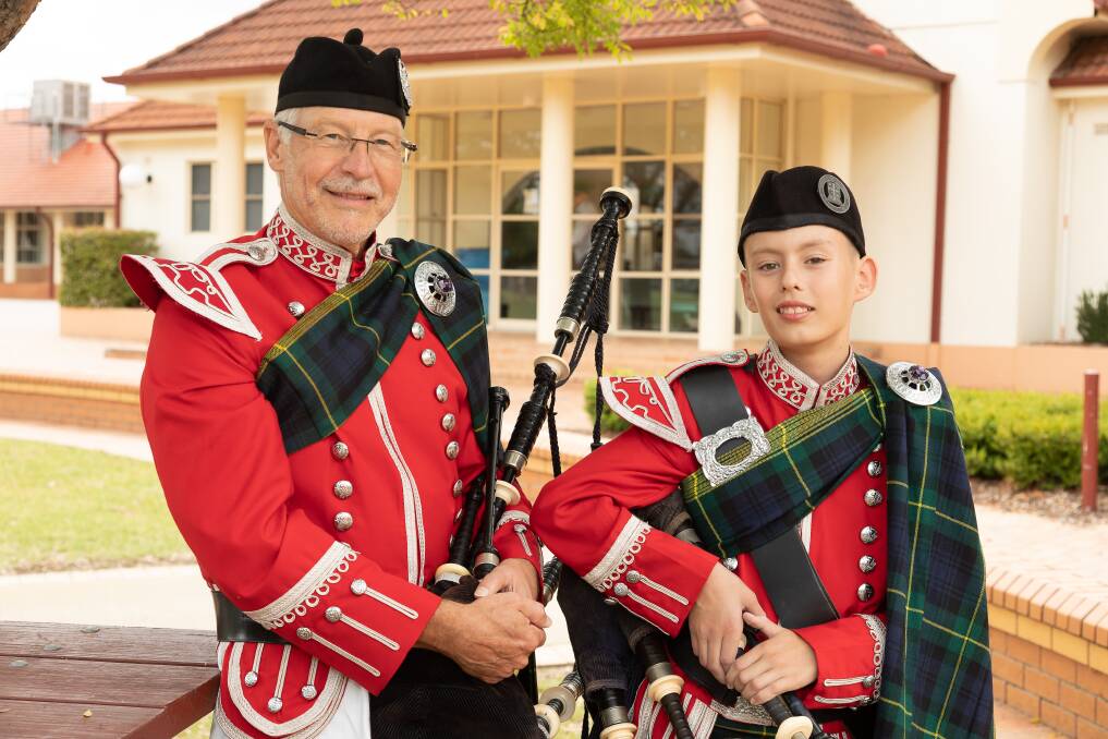 The Scots School Albury band's oldest and youngest pipers Doug McRae, 66, and Saxon Coffey, 12, are excited for Edinburgh. Picture by The Scots School Albury