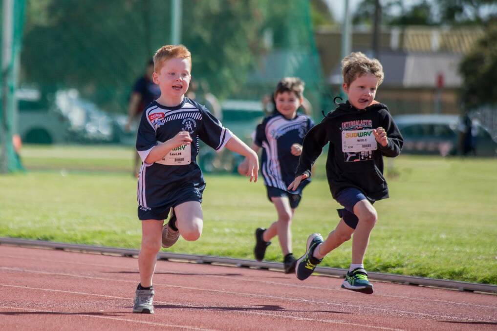HEAD TO HEADL Levi and Will keep their eyes on the finish line in the under-six sprints as part of Albury Little Athletics Centre's weekend competition. Picture: ANTHEA ENGLISH
