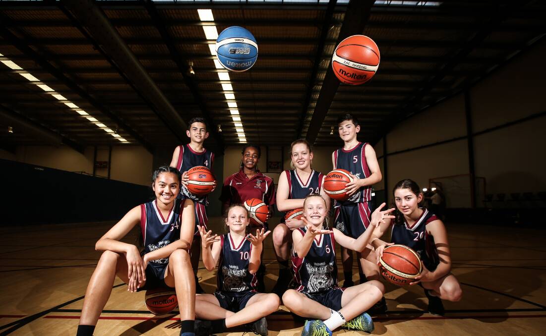 STATE DUTIES: Wodonga Wolves' juniors (front) Sandhya Thapa, Evie Hughes, Tahli Smith, Casey Ardern, (back) Riley Gill, Christine Oguche, Katelyn Russell and Josh Ivic have all made country Victoria teams. Picture: JAMES WILTSHIRE