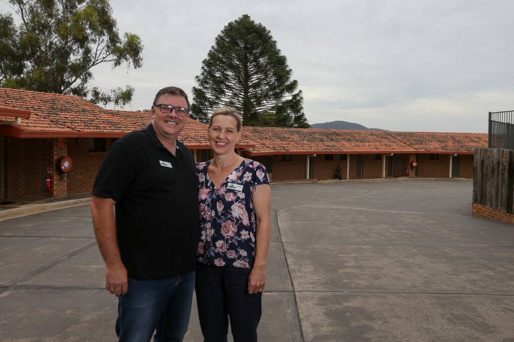 FLASHBACK: An empty car park was an all too familiar sight for Hume Country Motor Inn owners Craig and Jackie Wakley in 2020 and 2021, but the motel is fully booked for Friday night's AFL practice match at Lavington Sports Ground.