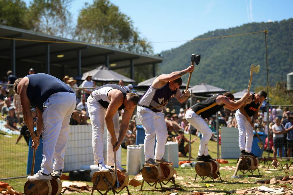 AXES FLY: Wood chop competitors at Sunday's Mighty Mitta Muster play their part in adding to the entertainment. Picture: JAMES WILTSHIRE