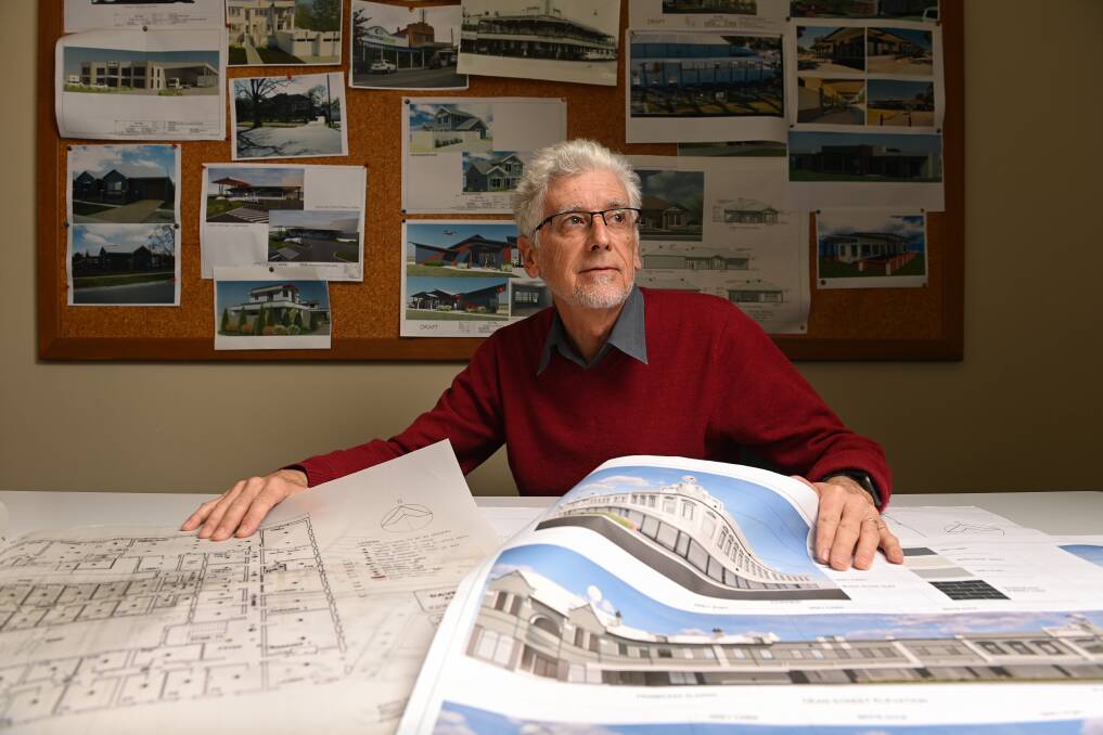 GLASS HALF FULL: Border building designer Phil Wilkins has been diagnosed with an incurable form of lung cancer caused by exposure to asbestos, but is proud of the legacy he will leave through his work. Picture: MARK JESSER