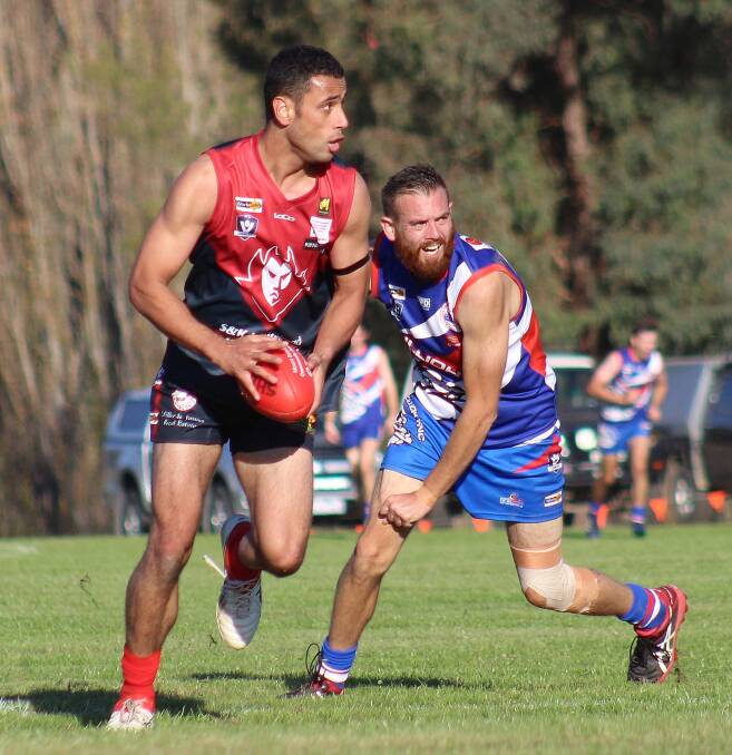 OPEN SPACE: Corryong recruit Jordan Rawaqa looks for an option further up the field during the Demons' loss to Bullioh in round one on Saturday. Picture: DEB HARRAP