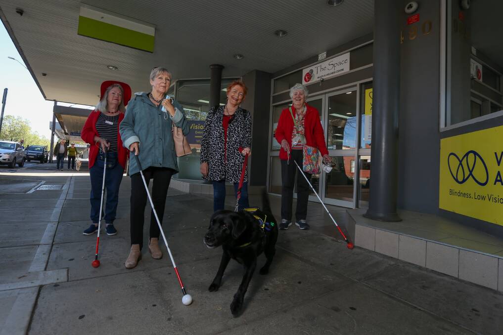 OFF FOR A STROLL: Helen Benham, Maree Kenny, Ilonka Trost, with her guide dog Zoe, and Rowena Ginns enjoyed a walk from Albury's Vision Australia office to celebrate International White Cane Day. Picture: TARA TREWHELLA