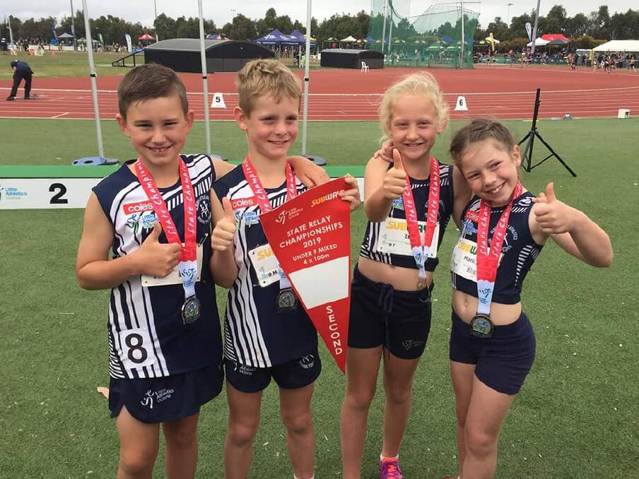 STATE SUCCESS: Albury athletes Jaxon Carr, Jack Godde, Isla Geddes and Marli Myers with their silver medals won at the Little Athletics State Relay Championships.