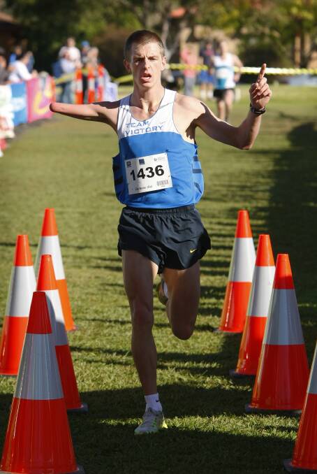 Paralympian Michael Roeger claims the 2009 Nail Can Hill Run, the first time the event finished at Boonie Doon Park in West Albury. File picture