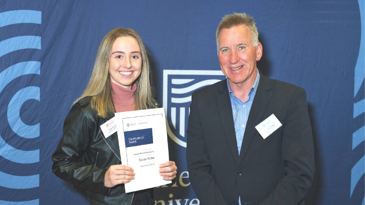 WELL DONE: Charles Sturt University student Sarah Richie was presented an Albury council scholarship by outgoing Albury mayor Kevin Mack this year.