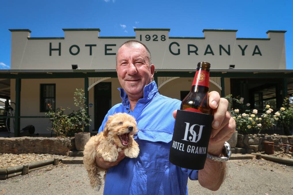 ONE TIME ONLY: Hotel Granya co-owner Garry Paxton, with Max, will welcome back patrons on Sunday as the pub hosts the Peninsula Seasonal Markets. COVID forced it to close in September. Picture: JAMES WILTSHIRE