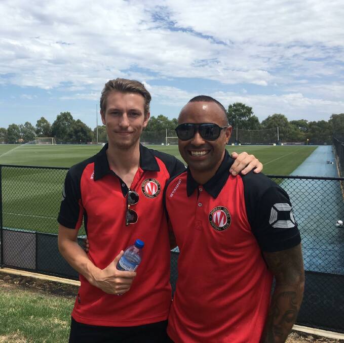 WELCOME HOME: Murray United defender Nick Teichmann alongside Archie Thompson before the former Socceroo's debut for the club on Saturday.