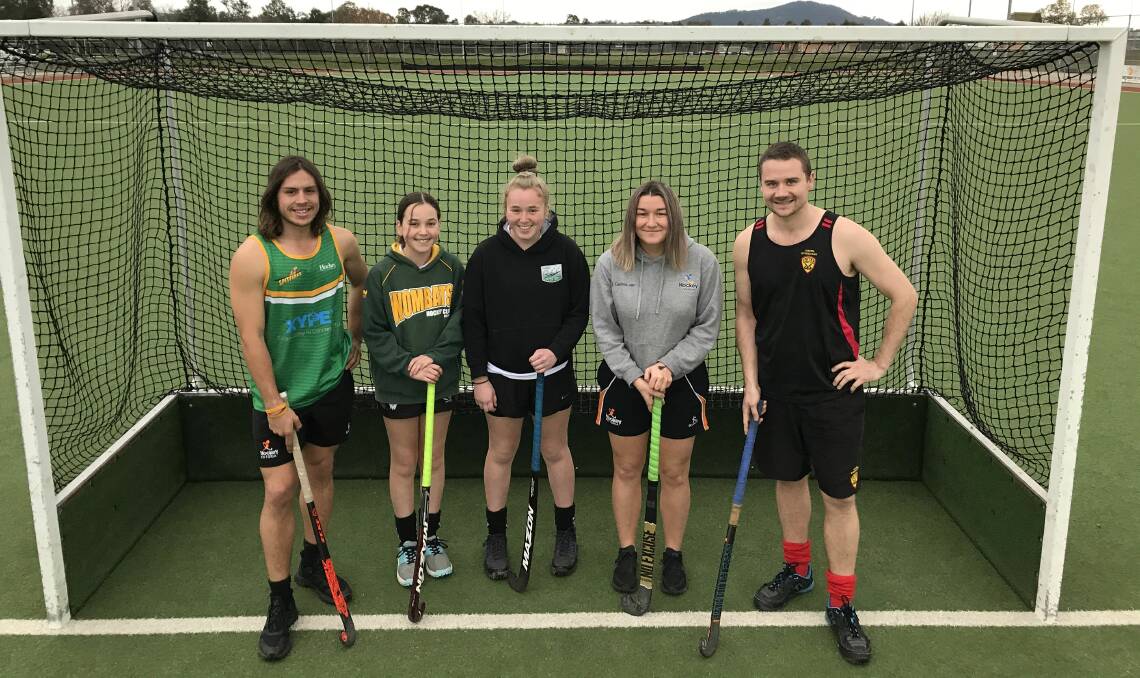 FIRED UP: Noah Erdeljac, Ava Henderson, Ella Henderson, Caitlin Baine and David Foster are ready for a return to hockey. Picture: ANDREW MCMILLAN
