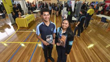 Wodonga Senior Secondary College year 12 students Christopher Bayliss, 18, and Mione Palima, 17, took the opportunity to explore their future job options at the school's third annual Careers in Industry expo on Thursday, May 16. Picture by Mark Jesser 