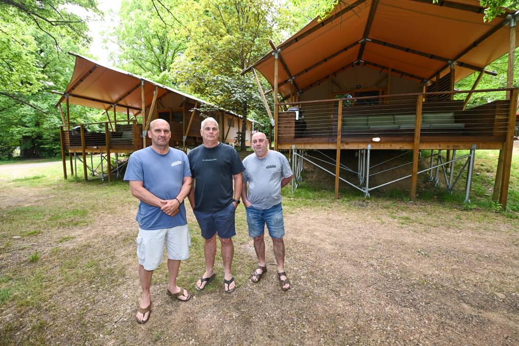 Noel McKay, Rodney Fisher and Mick Lamb in front of two of the glamping tents, not used for three years due to building regulations. Picture by Mark Jesser