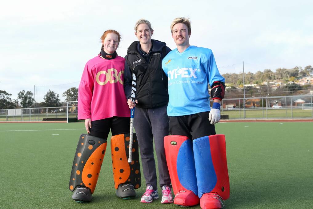 VALUABLE EXPERIENCE: Ella Therkildsen, Hockeyroos star Rachael Lynch and Patrick Baine following her successful goalkeeping clinic at Albury Hockey Centre on Thursday. Picture: TARA TREWHELLA