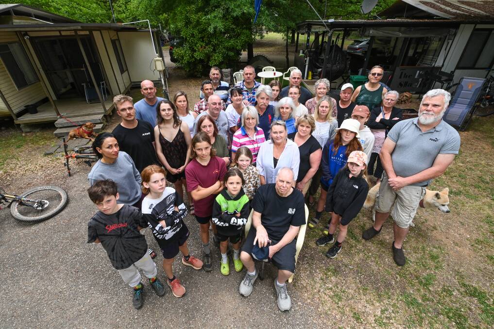 This group of Bright Holiday Park regulars are among the 34 annual site holders asked by NRMA Parks and Resorts to move from their current location. Picture by Mark Jesser