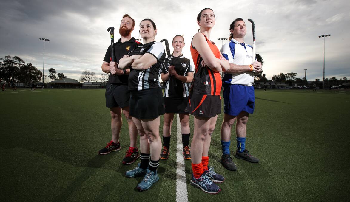 THE FINAL COUNTDOWN: CR United's Scott Anderson, Magpies' Katy Smithwick and Riley Sutherland, Falcons' Kate McKee and Norths' Ian Beath are primed for Sunday's Hockey Albury-Wodonga grand finals. Picture: JAMES WILTSHIRE