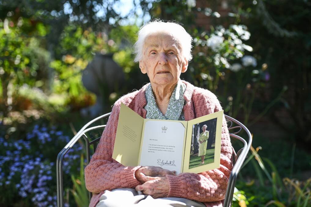 CENTURION: Wodonga's Maisie Newnan displayed her letter from The Queen as she celebrated her 100th birthday yesterday. Picture: MARK JESSER