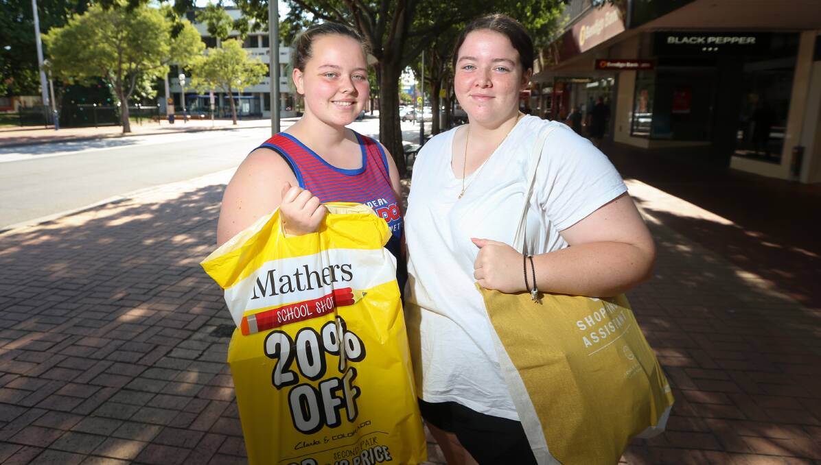 EARLY START: Taylor and Hayley Threlfall were able to beat the Boxing Day rush to find what they wanted in Albury.