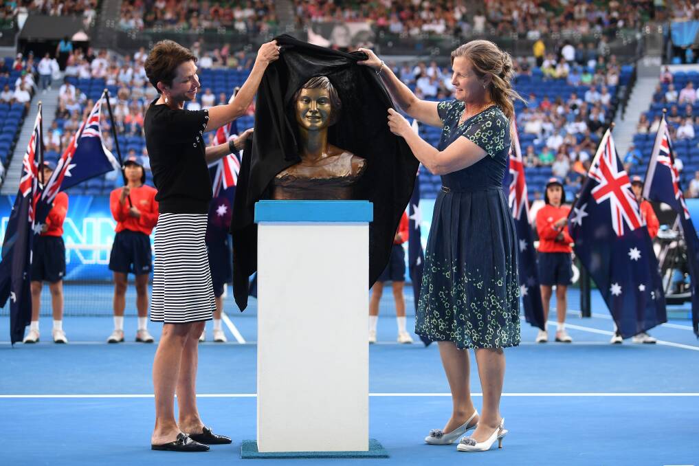 SPECIAL MOMENT: Albury's Dianne Balestrat (right) unveils a bust in her honour as she is inducted into the Australian Tennis Hall of Fame. Picture: AAP IMAGE/LUKAS COCH