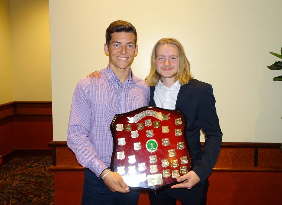 TOP HONOUR: CR United's Sam Quick was presented the Bob Smart Memorial Trophy for the division one men's best and fairest by Oscar Smart. Picture: CAYTE CAMPBELL