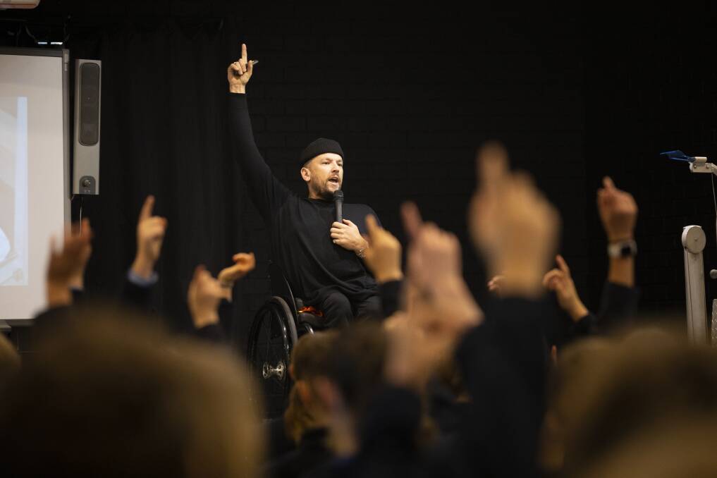 HANDS UP: Dylan Alcott interacts with Myrtleford students during a presentation at Club Savoy on Thursday. Picture: ASH SMITH