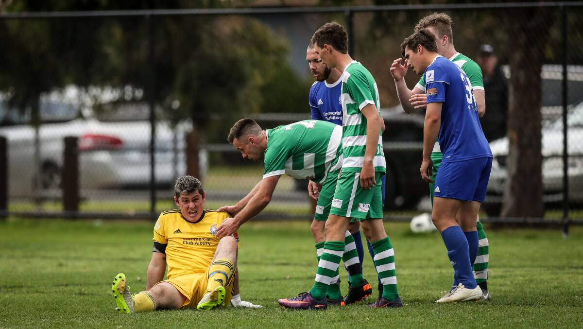 Albury City goalkeeper Campbell Taylor (left) and Albury United captain Caleb Martin are the leaders in two major voting categories at the halfway mark of the AWFA season.