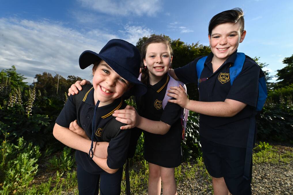 WE ARE FAMILY: Bandiana Primary School students Thoadora, 8, year 2, Elizabeth, 9, year 4 and Nik Fitourakis, 11, year 5, enjoyed taking part in Walk to School October. Picture: MARK JESSER