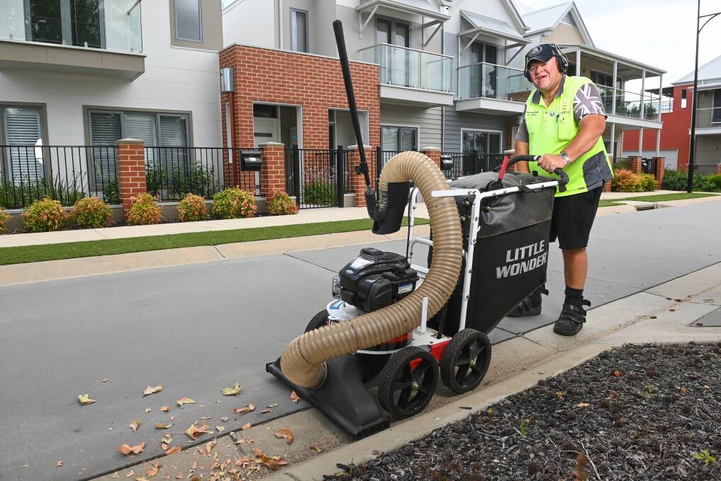 HARD AT WORK: Elmwood resident Christopher Parnaby was crowned the Wodonga estate's Australian of the Year. He purchased a street sweeper with his own money to keep the neighbourhood tidy. Picture: MARK JESSER