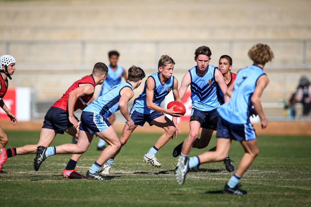 ON FIRE: Corowa's Mitchell Parker works his way out of the centre for NSW Combined High Schools. Picture: JAMES WILTSHIRE