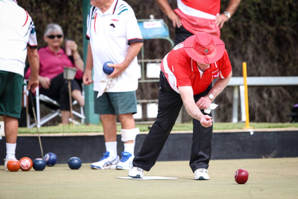 EXCELLENT: Roger Meyers bowls for Henty's grade three team during the Albury and District pennant grand final against Lavington. Picture: JAMES WILTSHIRE