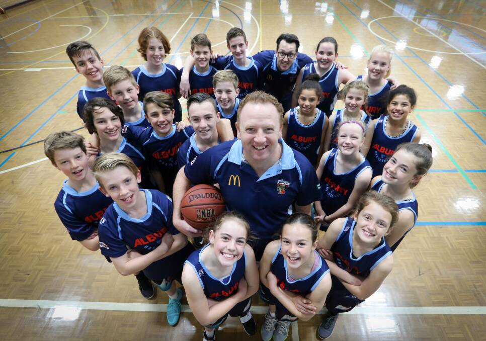 Under-14 boys coach Shane Strang (middle) and under-12 girls coach Mathew Whitfield (back) have prepared their sides for the state championships. Picture: KYLIE ESLER