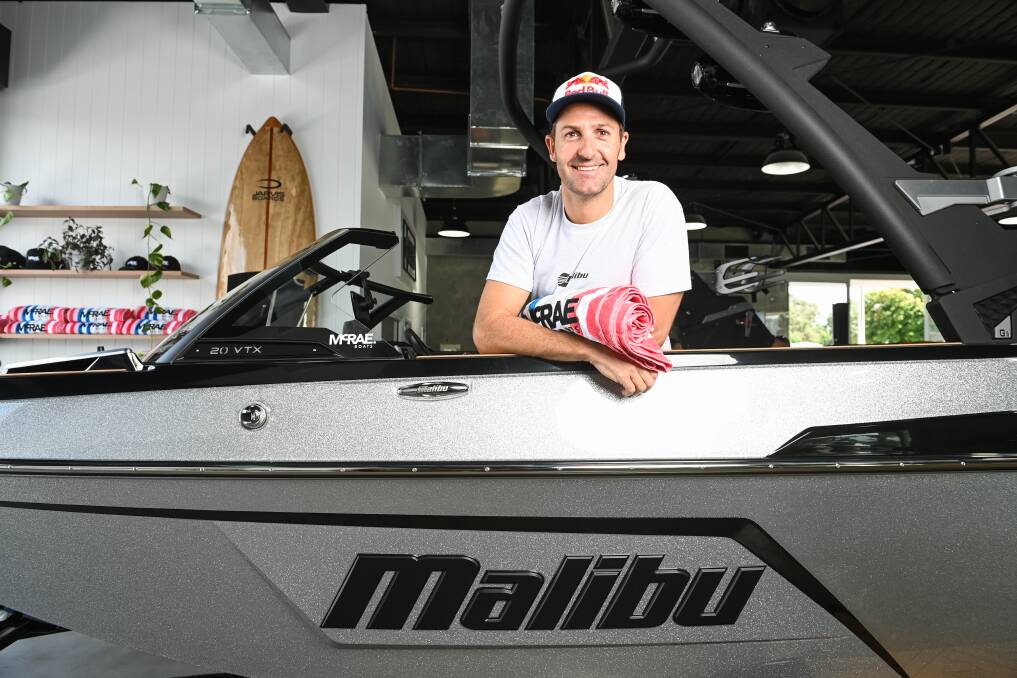 DOWNTIME: Supercars Hall of Fame inductee Jamie Whincup checks out a new boat during a visit to Wodonga yesterday. Picture: MARK JESSER