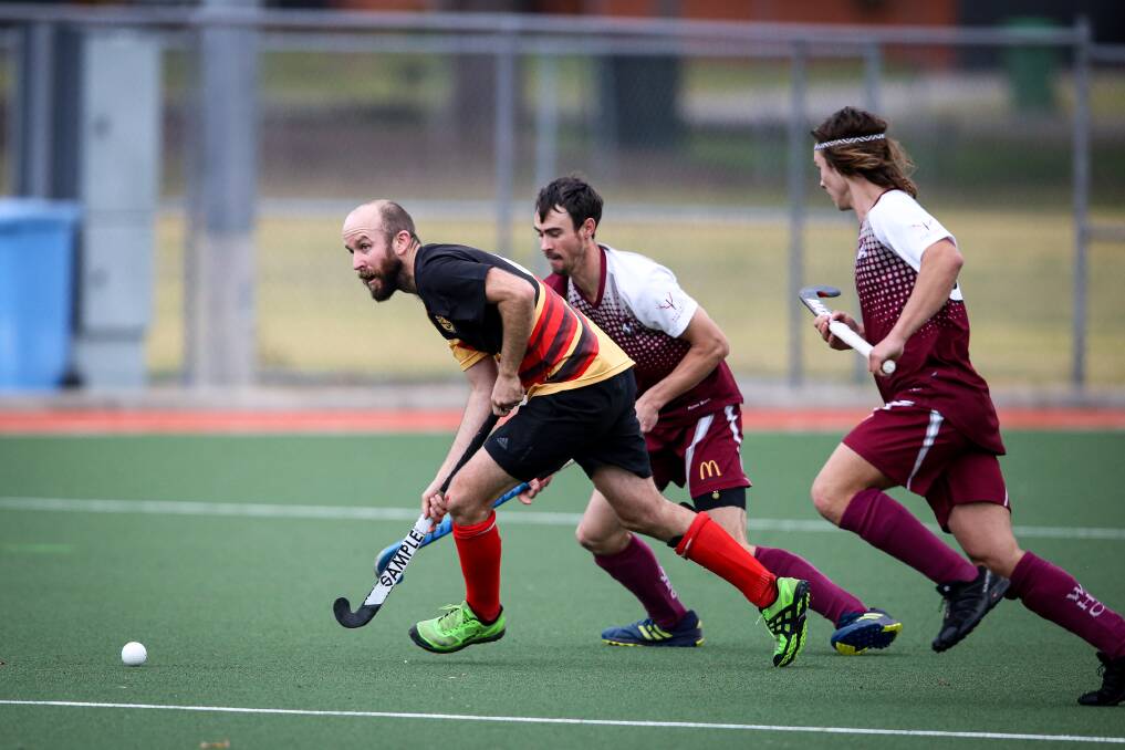 IN CONTROL: Tim Smith looks to send CR United into attack against Wodonga at Albury Hockey Centre on Sunday. United didn't miss a beat after no games last weekend.
