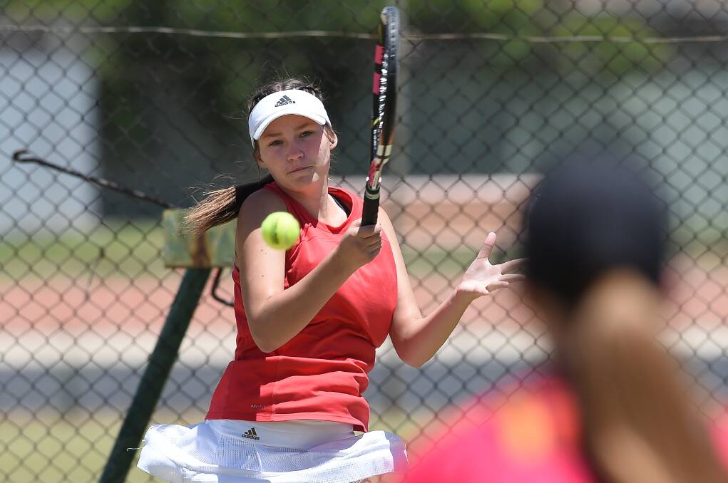 CONCENTRATION: Jessica Knoth launches a forehand return during section one women's pennant at the Albury grasscourts. Picture: MARK JESSER