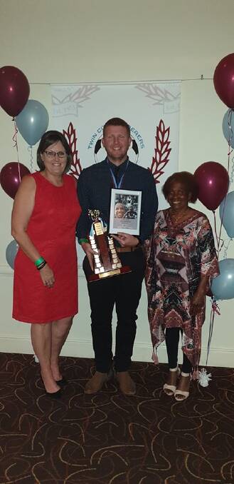 TOP YEAR: Cayne Wilhelm, with mother, Sandi and Esther Thompson, mother of Archie Thompson, after winning Twin City's best and fairest on Saturday night.