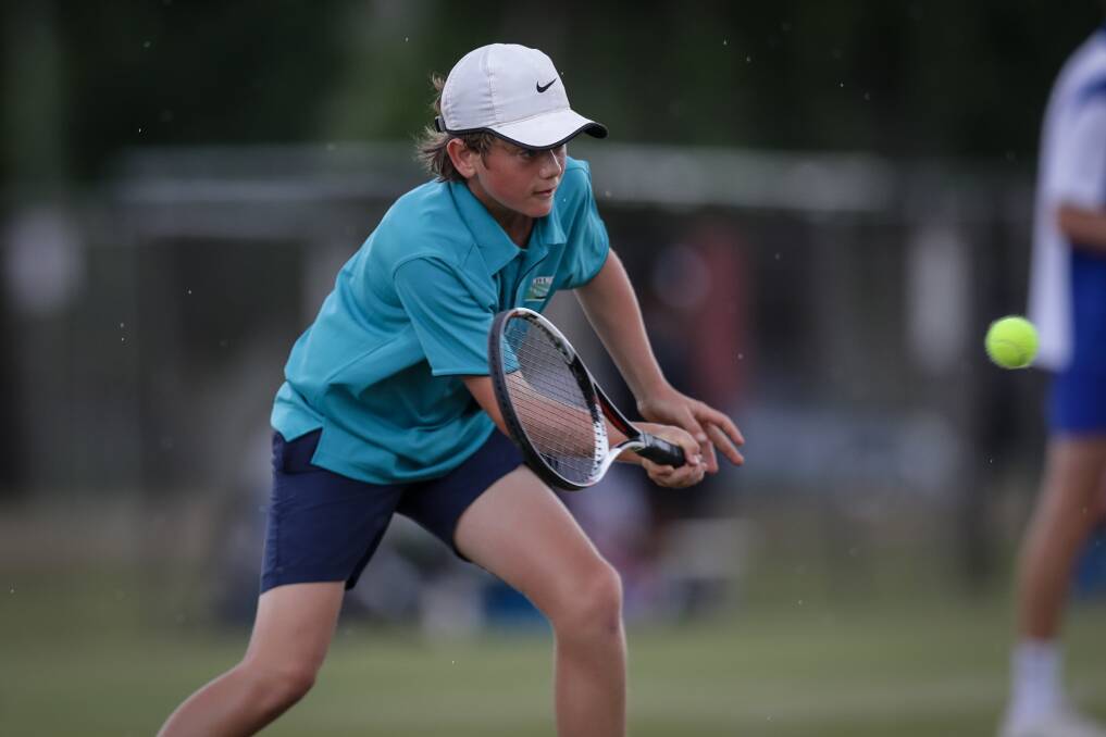 CRISP: Xavier High School's Rory Parnell connects with a volley on day three of the Australian Schools Tennis Challenge. Picture: JAMES WILTSHIRE
