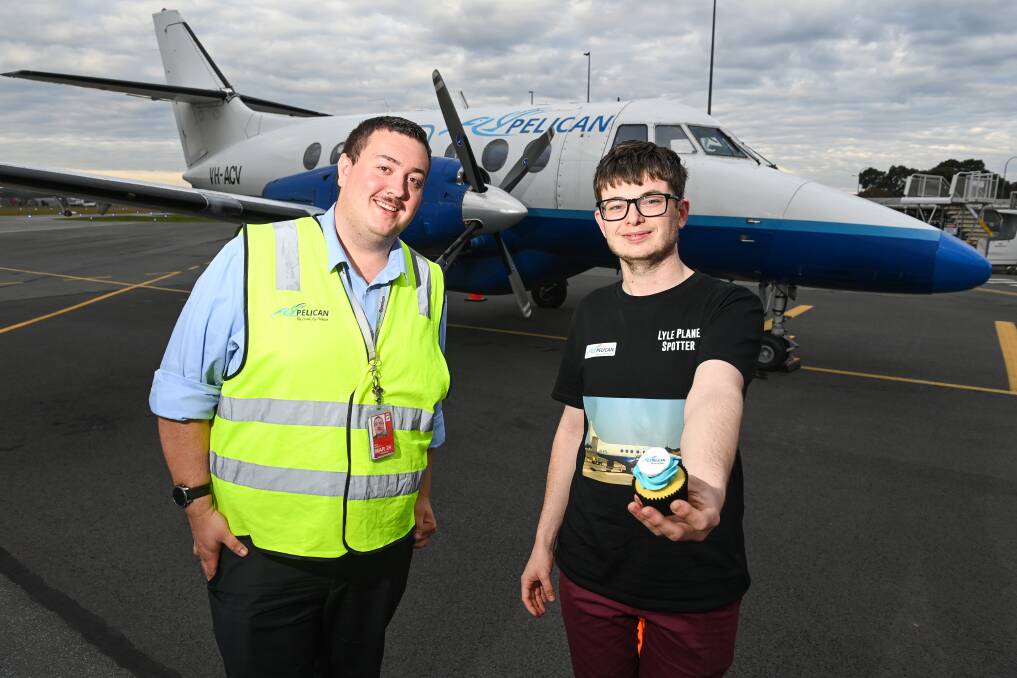 FlyPelican chief executive Henry Murcott with Border plane spotter Lyle Taylor after arriving in Albury on Tuesday, August 29. Picture by Mark Jesser