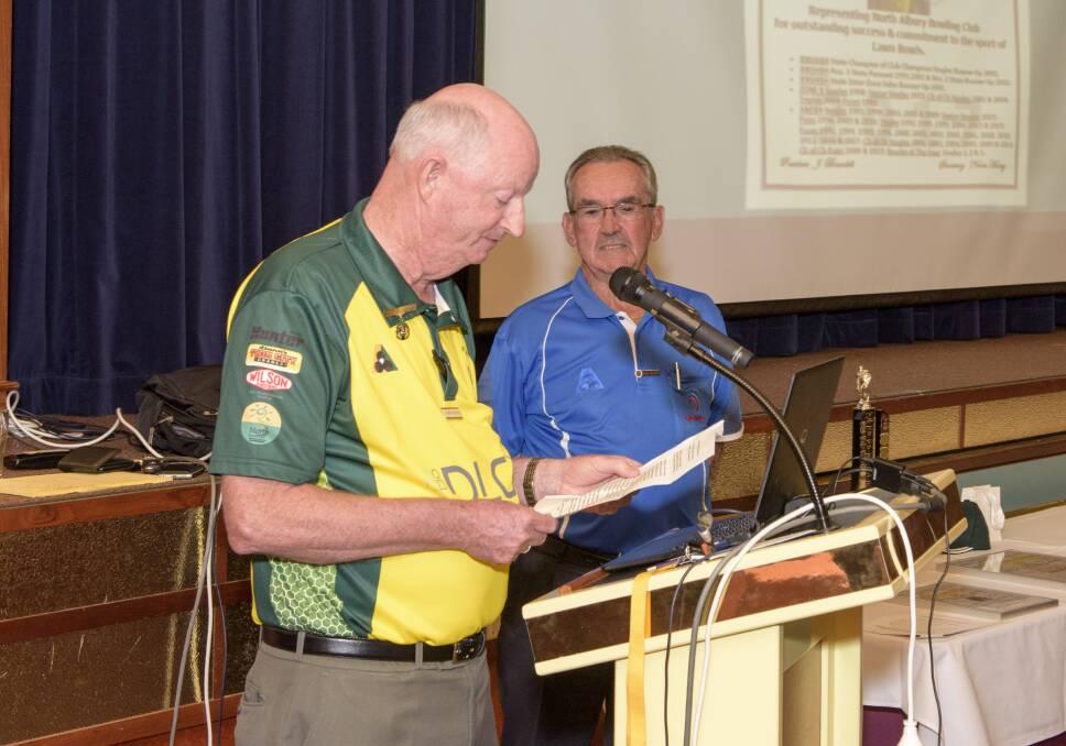 WELL DONE: Albury and District Bowling Association secretary-treasurer Norm Honey addresses the room alongside Bowls NSW president Barry Watkins.