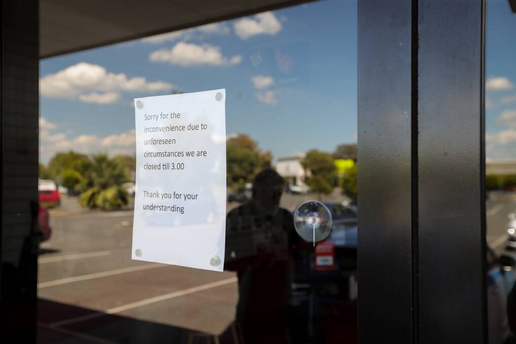 A note explaining a temporary closure of Albury's Godfreys store on Tuesday, January 30. Picture by James Wiltshire