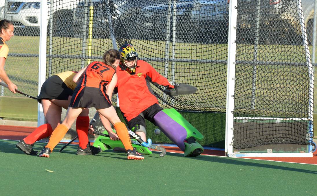 KEY MOMENT: Ellie Florence scores late in the game to help Falcons to a 2-0 win against CR United at Wodonga Hockey Centre on Sunday. Picture: NARELLE HAMILTON