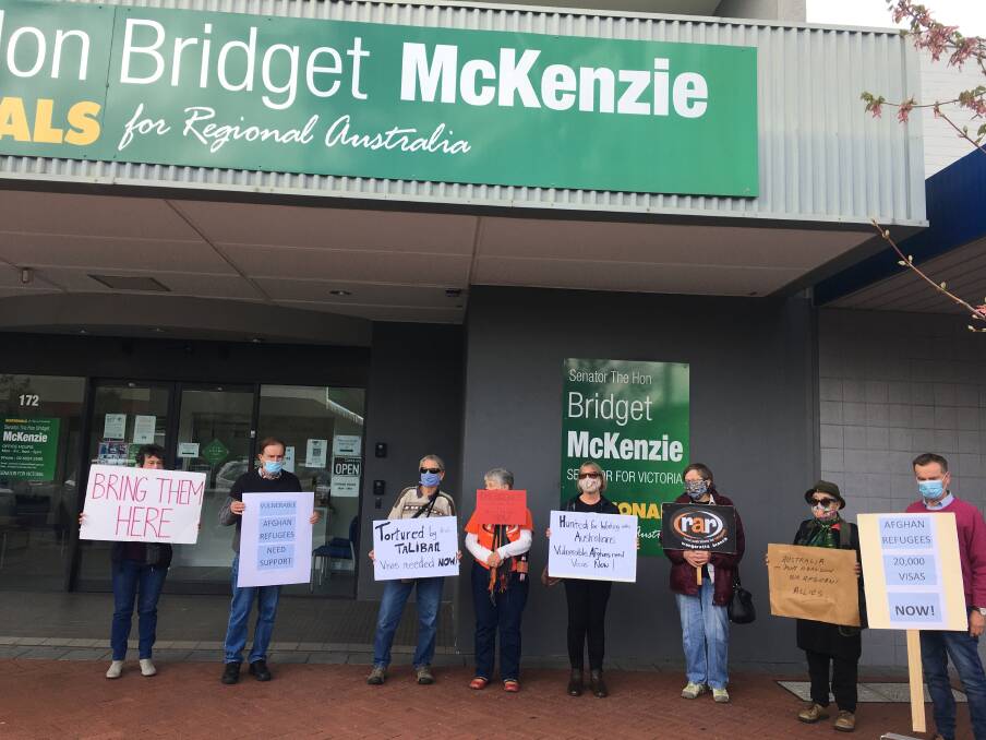 HEAR US OUT: Members of the Indi Rural Australians for Refugees held a vigil outside Senator Bridget McKenzie's Wodonga office on Thursday to raise awareness about the difficulties facing Afghan refugees.