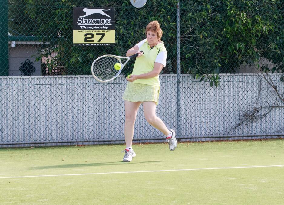 STRONG RETURN: Helen Fuge puts the ball back in play during Tuesday ladies pennant at the Albury grass courts. Picture: SIMON BAYLISS
